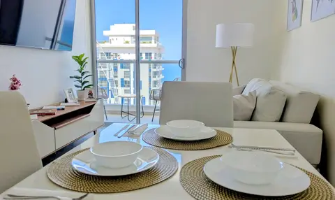 Sun-kissed living room curated for ultimate relaxation.
