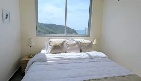 Warm secondary bedroom with double beds – ideal for families.
