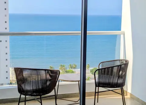 A cozy spot to enjoy your morning coffee with a sea breeze.